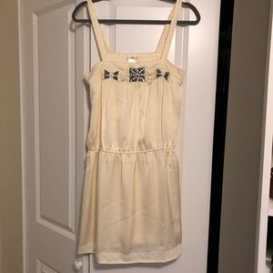 Cream colored dress with beaded detail